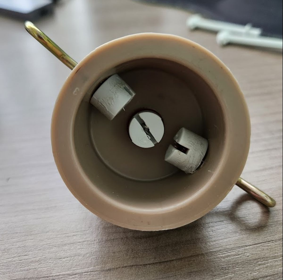 Inside of the end cap with the hooks and connectors