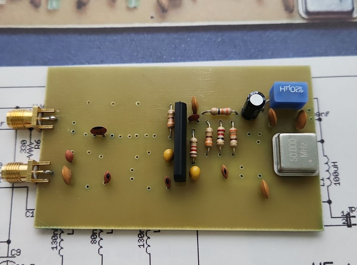 Board with the first components soldered
