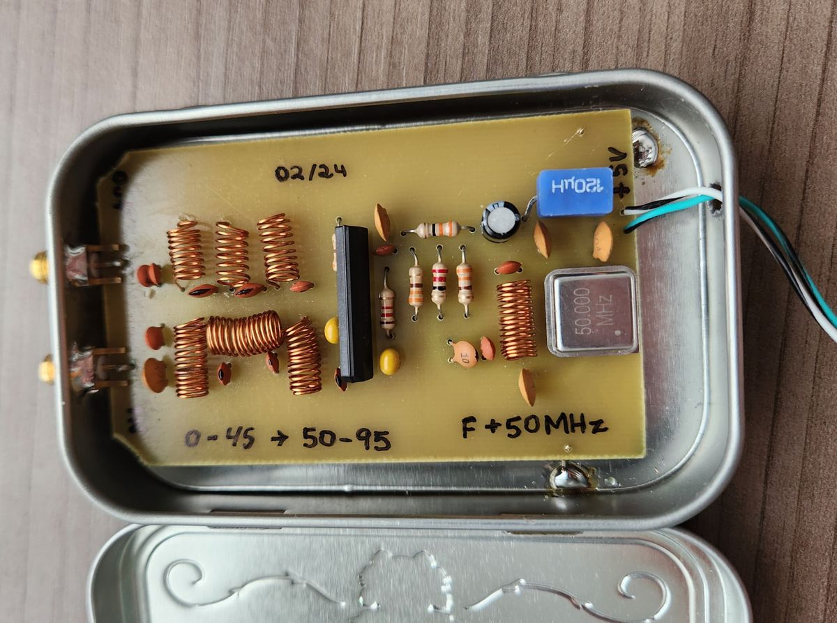 Board installed in the tin, with the frequency markings