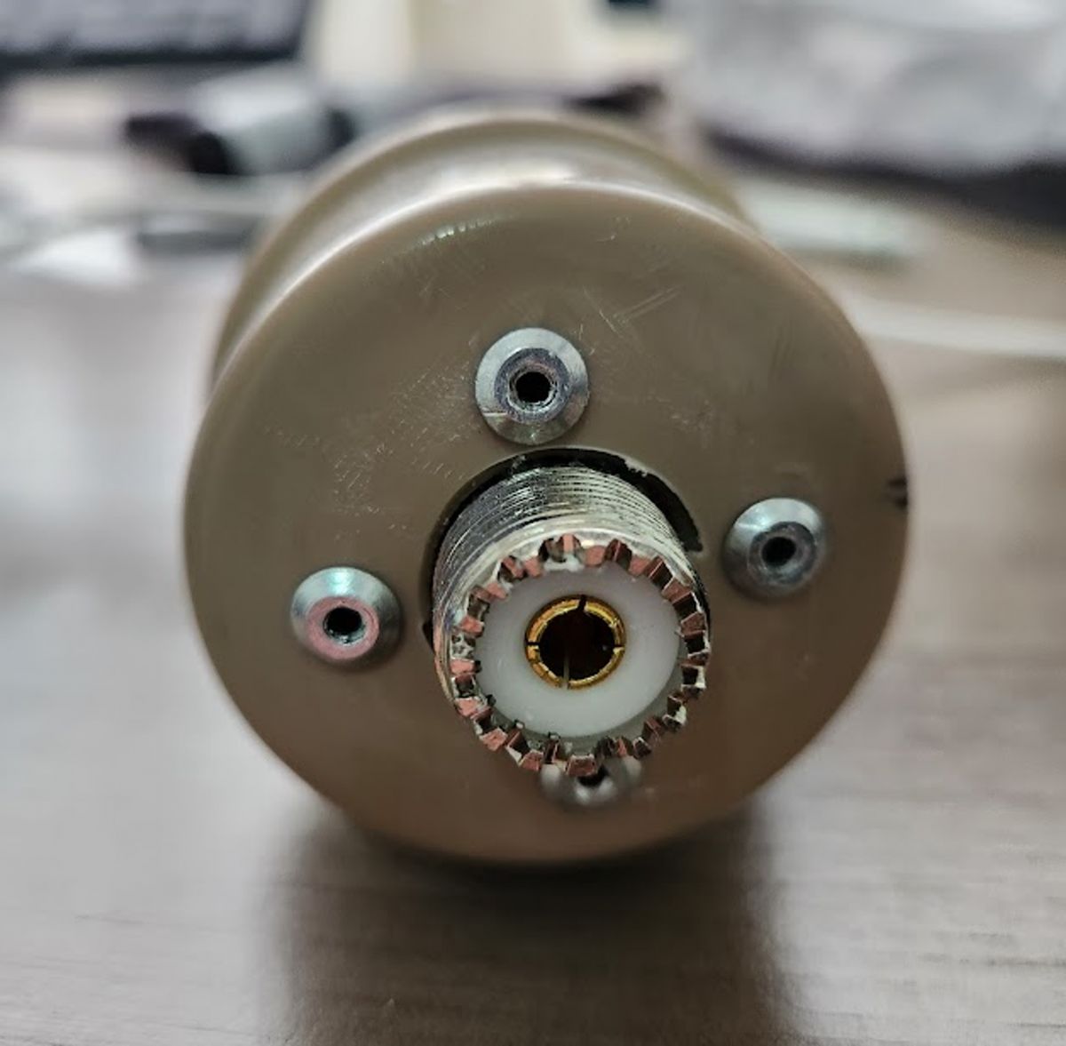 Bottom cap with the UHF female connector