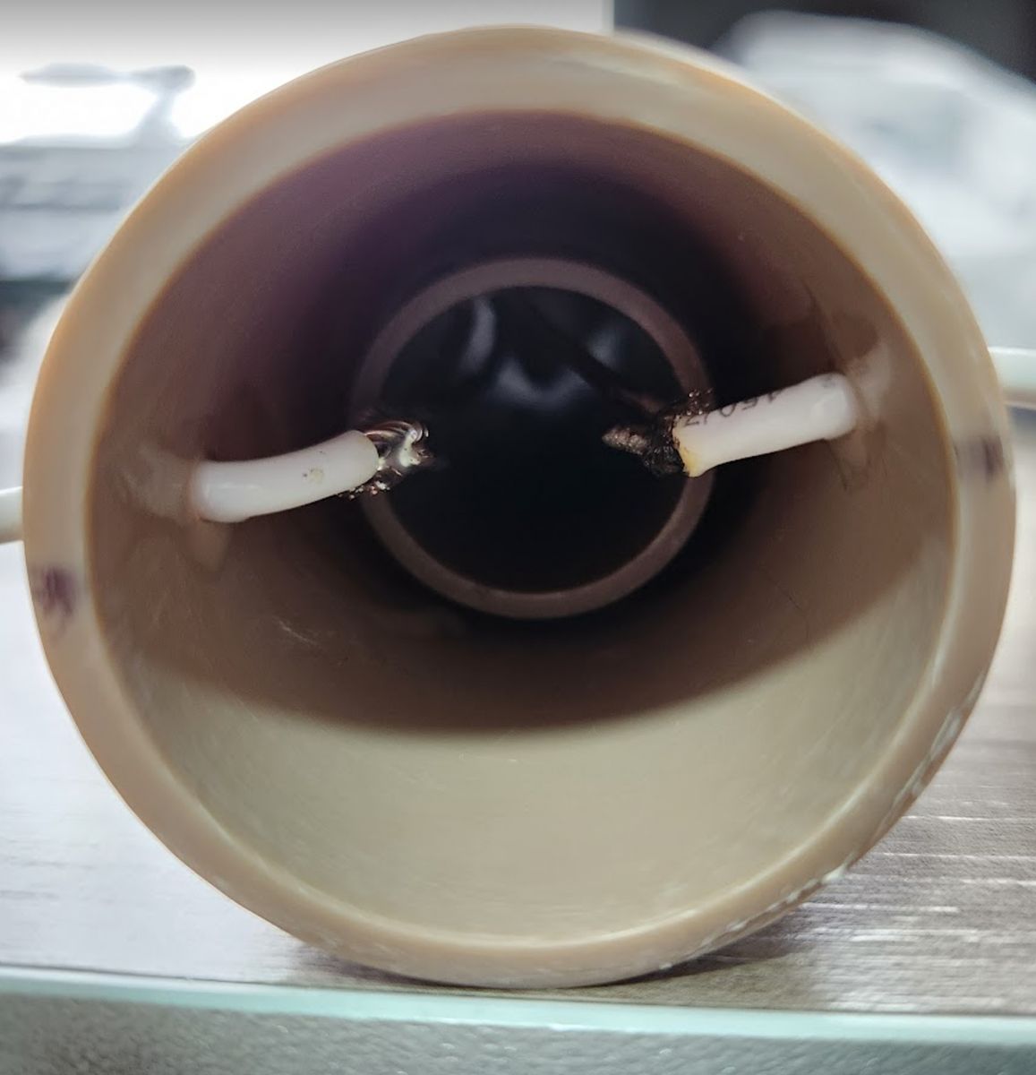 Inside of the pipe with the wiring soldered