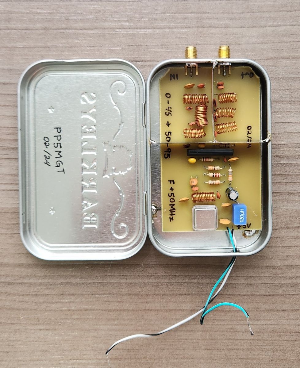 Open tin, with shielding between the stages